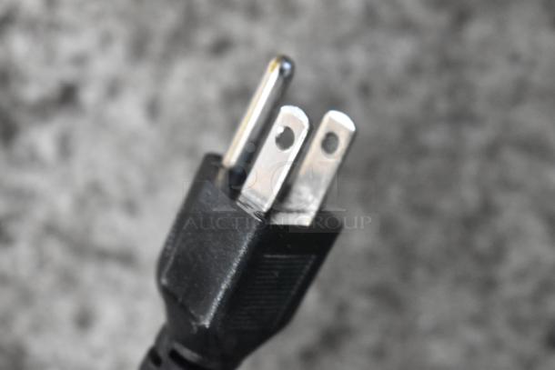 Close-up of a standard three-prong electrical plug attached to the Town 56916S rice warmer, emphasizing connectivity.