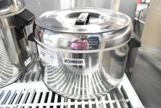 Brand new Zojirushi RDS-400 stainless steel sushi rice container; 44 cup capacity. Slight scratch and dent visible.