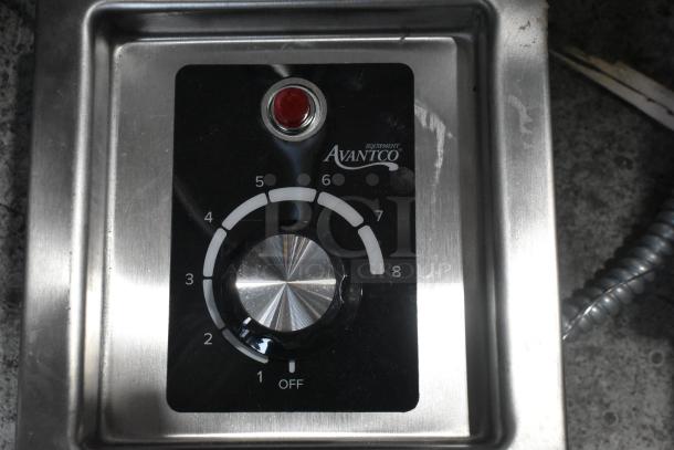 Avantco 177TM12B hot food well control panel, stainless steel, features adjustable dial and Avantco branding, minor scratches visible.