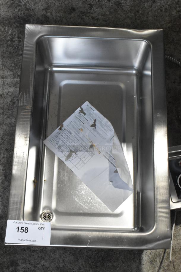 Avantco 177TM12B hot food well, stainless steel, top mount, round corners, drain visible. 208V, 1 phase. New, minor scratches.
