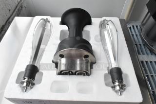 Brand new VitaMix VM0224A immersion blender with two whisk heads in packaging; marked "HAND WASH ONLY."