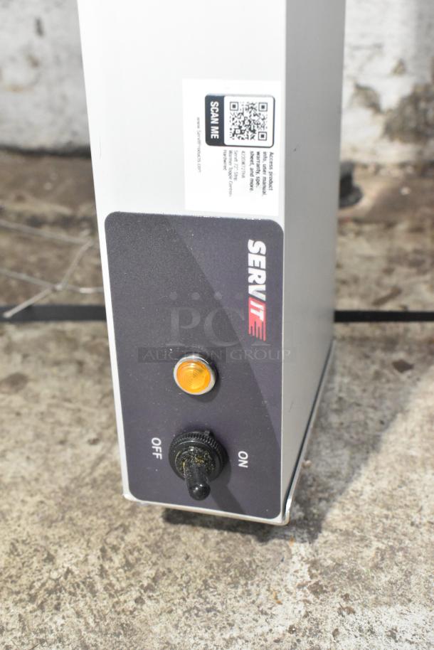 BRAND NEW SCRATCH AND DENT! ServIt 423SW72THA 72" strip warmer, single toggle control, 120V, model label visible.