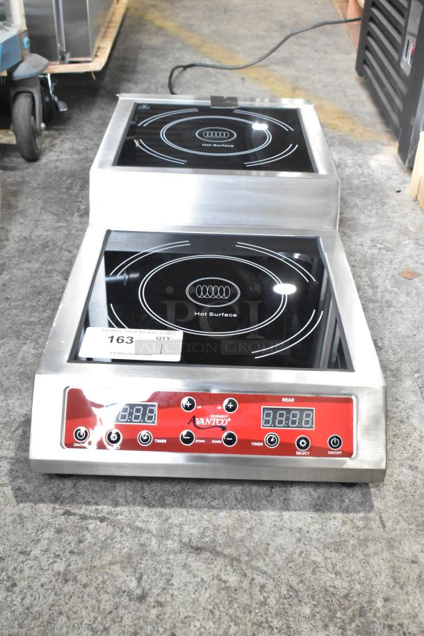 Brand new Avantco 177IC35SU stainless steel double countertop step-up induction cooker, 208-240V, with digital controls.