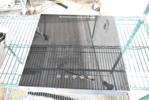 Brand new Avantco 177ICW300 black induction warmer, 16"x16", scratch and dent, 120V, 1 phase, touch controls.