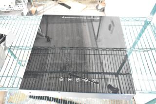 Brand new Avantco 177ICW300 black induction warmer, 16"x16", scratch and dent, 120V, 1 phase, touch controls.