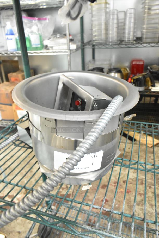Brand new Avantco 177TPSW7 7 Qt. soup warmer, 120V, top mount, slight scratch and dent, stainless steel, warehouse setting.