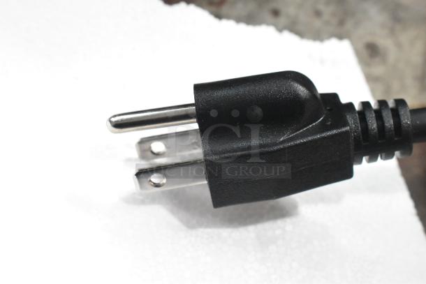 Black power plug of 2024 Avantco 360BCC28HCB refrigerated countertop bakery display case.