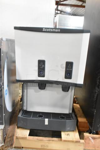 BRAND NEW SCRATCH AND DENT! 2025 Scotsman HID525AB-1A Meridian® Stainless Steel Commercial Countertop Ice Machine and Water Dispenser with Push Button Dispensing - 25 lb. Bin Storage. 115 Volts, 1 Phase. - Item #1197919