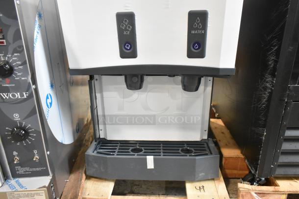 Brand new Scotsman HID525AB-1A stainless steel ice and water dispenser with push button, 25 lb. bin, 115V, countertop model.