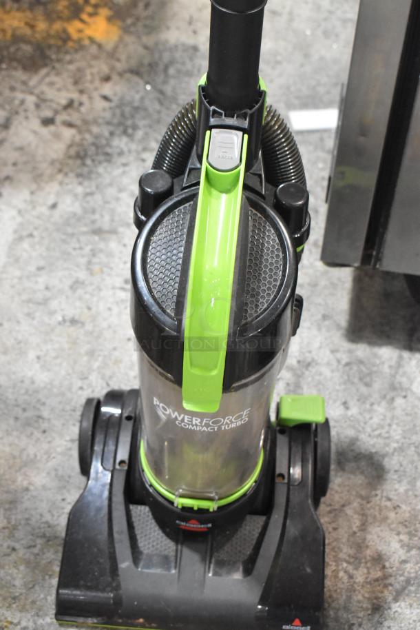 Brand new Bissell 2690 Power Force Compact Turbo bagless vacuum, 120V, showing scratch and dent condition.