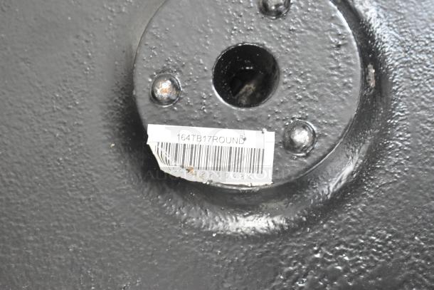 BRAND NEW SCRATCH AND DENT lot of 8 items; 164TB17ROUND Lancaster 17" round cast iron table base plate with visible barcode label.