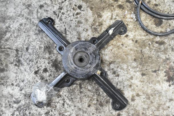 BRAND NEW SCRATCH AND DENT! 17" round cast iron table base plate, flat auto adjust post, visible scratch details.