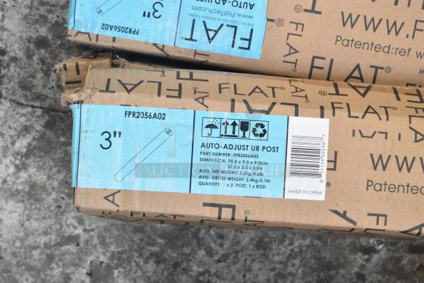 Alt text: Cardboard box labeled "FLAT" containing 3" Auto-Adjust UR Post, part number FPR2056A02. Box shows minor wear.