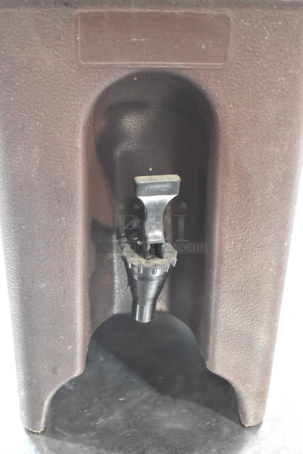 BRAND NEW Cambro brown poly beverage holder with minor scratches and dents, features durable spout, ideal for catering.