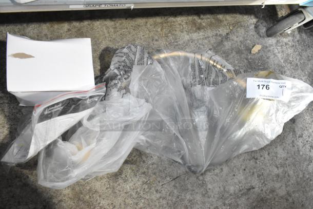 Brand new Cambro CK2502B004 warming lamp, gold finish, 115 volts, 1 phase. Packaging visible with warranty documents.