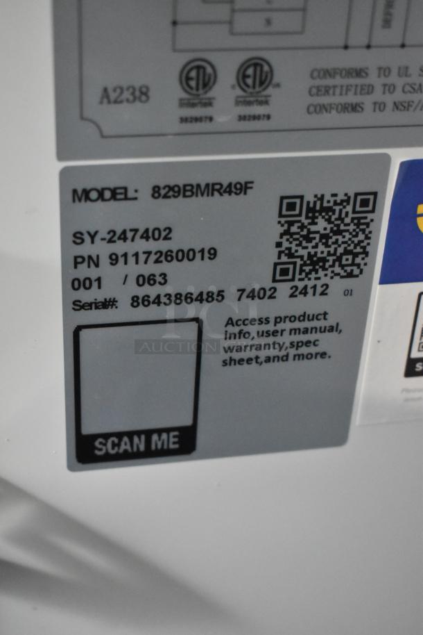 Mainstreet 829BMR49F stainless steel 2-door reach-in freezer, scratch and dent, poly-coated racks, 115V, 1-phase; label with QR code shown.