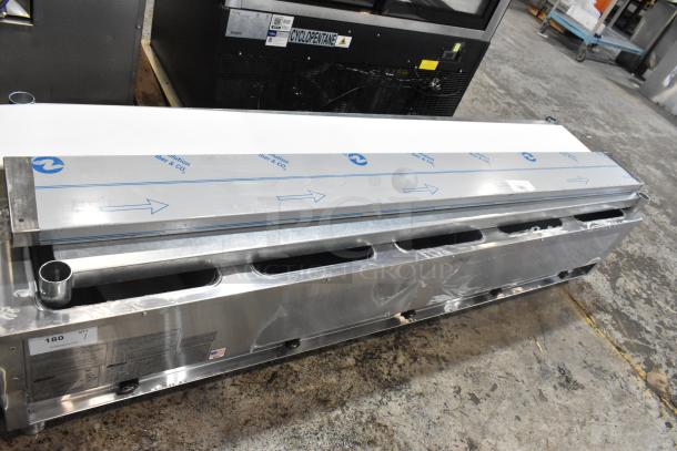 Brand new Eagle HT5-NG stainless steel steam table, five-pan, 17,500 BTU, with minor scratches and dents.