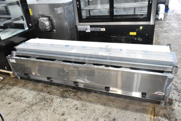 Brand new Eagle HT5-NG stainless steel steam table for five pans, natural gas, 17,500 BTU, with minor scratches.