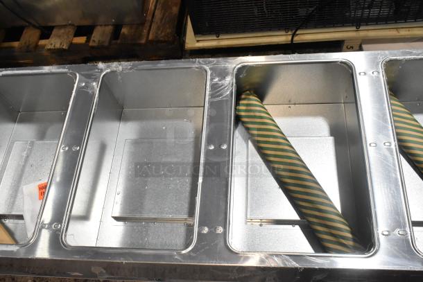 Eagle HT5-NG stainless steel commercial steam table, new with minor scratches, fits five pans, 17,500 BTU natural gas.