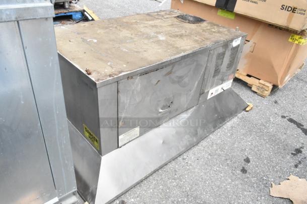 FloAire 940 stainless steel ventless hood, used, industrial wear. Model tags visible, 208/240 Volts, 1 Phase.