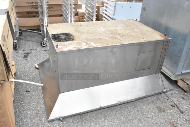 FloAire 940 stainless steel commercial ventless hood, 208/240 volts, 1 phase. Visible wear, sturdy design, ideal for kitchens.