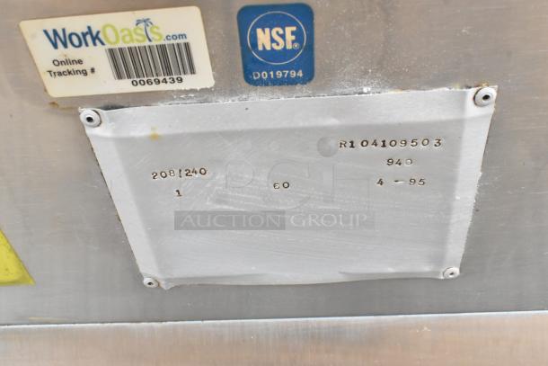 FloAire 940 stainless steel ventless hood, 208/240V, 1 phase. Tags show NSF certification and online tracking number.