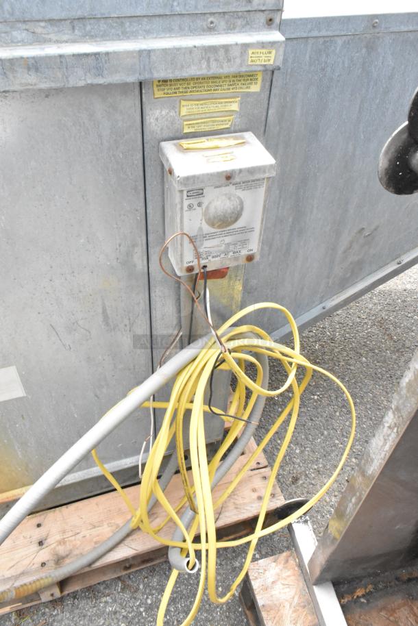 FloAire SA15 metal commercial filtered make-up air vent with power ventilator; includes visible control box and wiring.