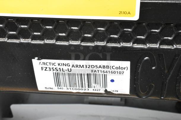 Arctic King ARM32D5ABB cooler label with model and serial numbers visible, in good condition.