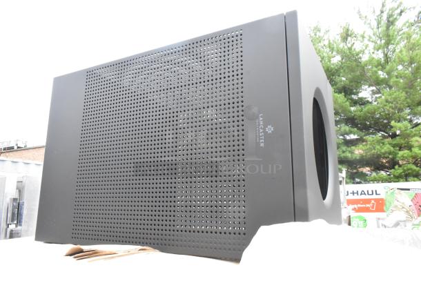 9 brand new Lancaster Table & Seating 40-gallon black perforated metal trash cans, with minor scratches and dents.