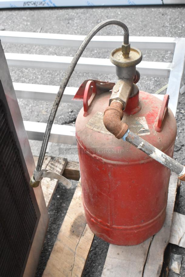 Auction items include VXD33 exhaust hood, Ice Head, Kitchen Knight II PCL-160 fire suppression tank, weathered condition.