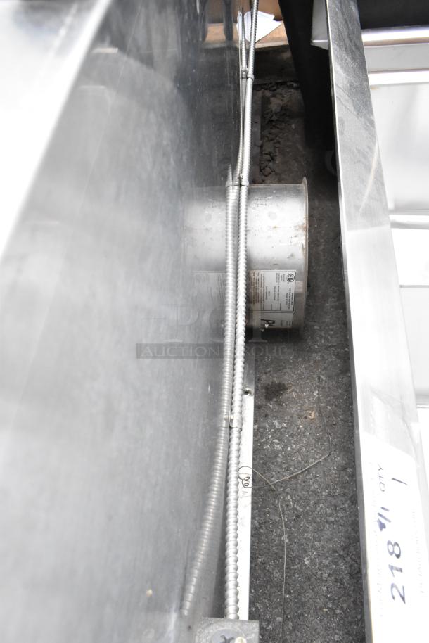 5' Ventilation Direct 3012 VXLL metal grease hood with integrated filters and lights, shown in good condition with visible labels.