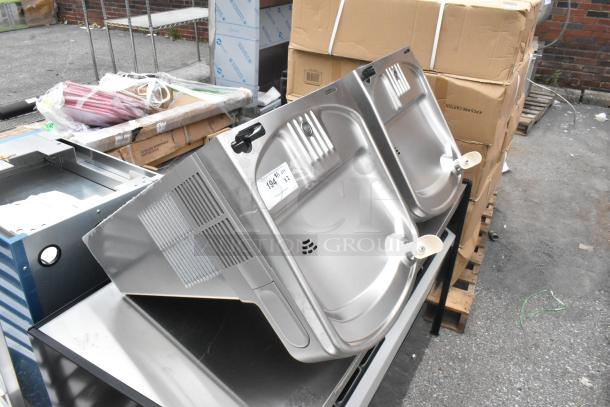 2 brand new Elkay EZSDWS_1G metal wall mount water fountains, 115 volts, 1 phase, with light scratches and dents.