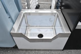 Brand new Regency 600SM162012N stainless steel floor mop sink with notched front, 20"x16"x12" bowl, 16-gauge.