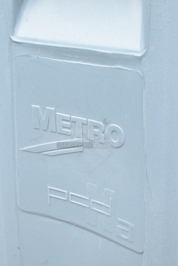 BRAND NEW Metro PCD Blue Poly Dish Cart with commercial casters. Visible logo and slight scratches.
