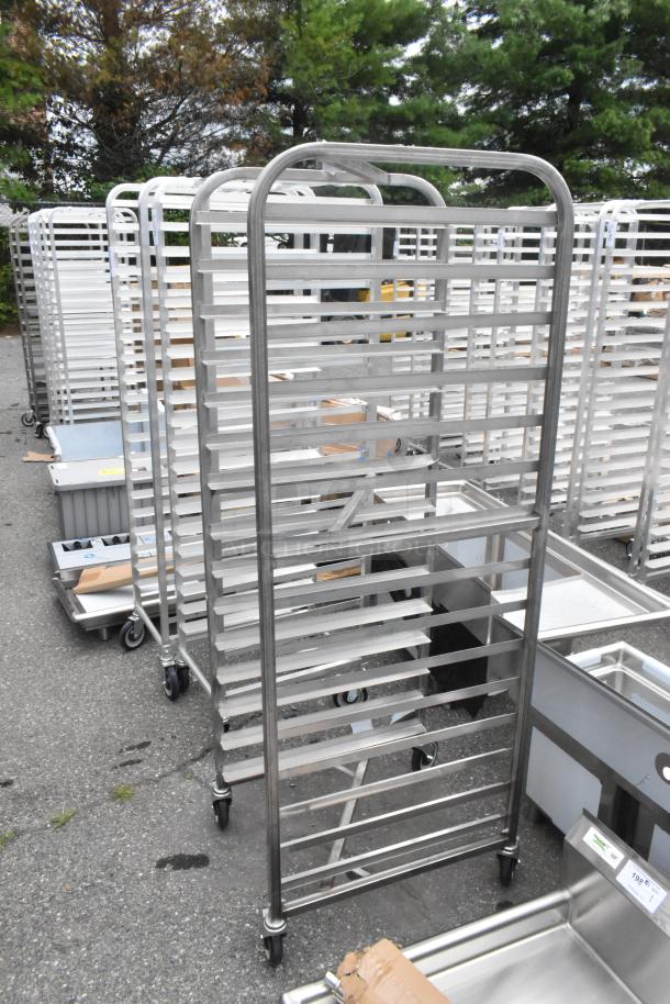 Brand new Channel 402SN 15 pan end load stainless steel nesting bun rack with commercial casters, minor scratches visible.