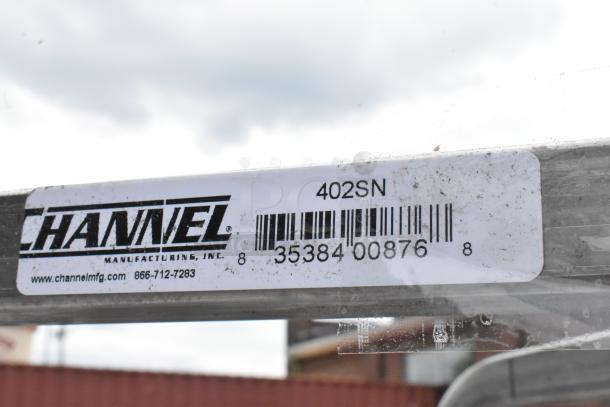 BRAND NEW SCRATCH AND DENT Channel 402SN, 15-pan stainless steel nesting bun rack, end load, with commercial casters. Visible label.
