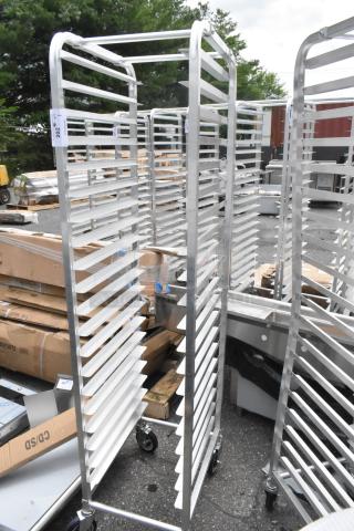 "New Regency 600STPR20KD 20-pan aluminum steam table pan rack on commercial casters, scratch and dent condition."
