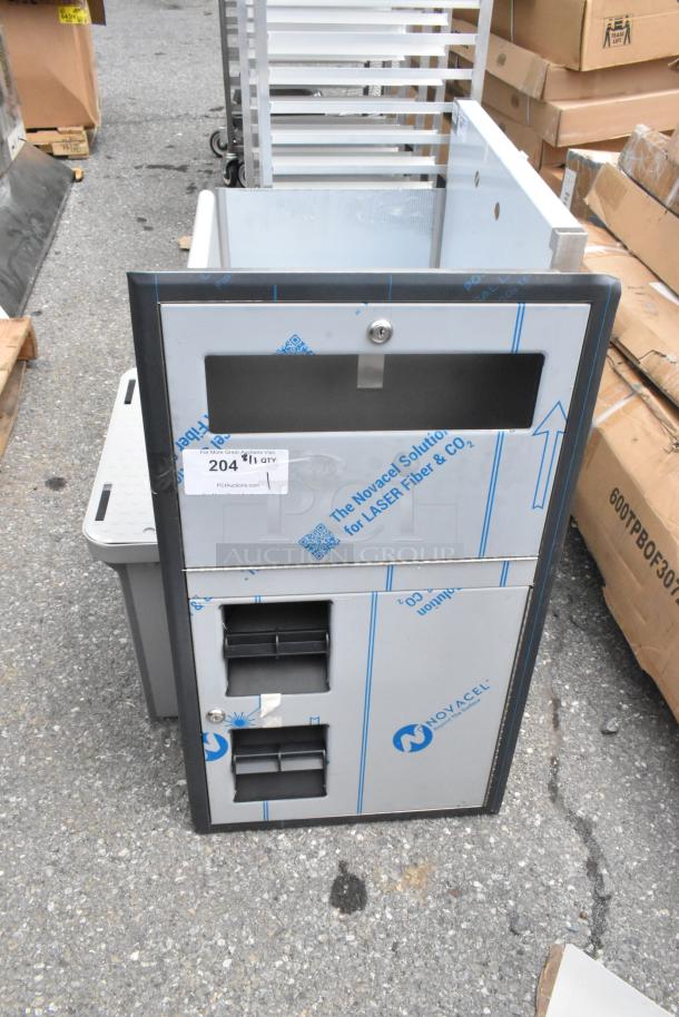 Stainless steel toilet paper dispenser, brand new with minor scratches. Protective film partially on. Lockable compartments.