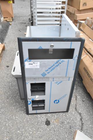 Stainless steel toilet paper dispenser, brand new with minor scratches. Protective film partially on. Lockable compartments.
