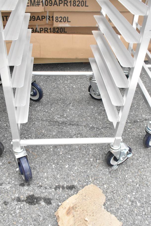 Brand new Regency 600STPR20KD steam table pan rack, 20-pan capacity, aluminum with commercial casters. Scratch and dent condition.