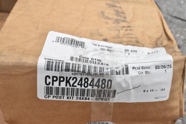 Cardboard box with labels showing product codes, case GTIN, and production details for shipping or inventory tracking.