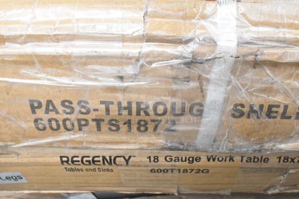 Regency 600PTS1872 pass-through shelf box. Marked 16-gauge stainless steel, new condition, with visible taped packaging.