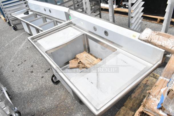 Regency 600S12424218 stainless steel single bay sink with dual drain boards, brand new scratch and dent condition.