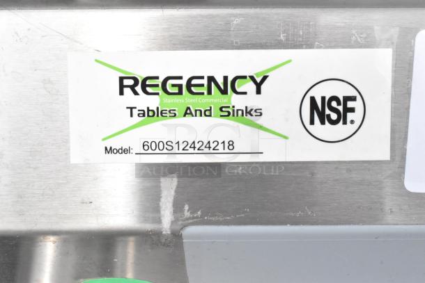 Stainless steel Regency sink label with Model 600S12424218, NSF certification, showing table and sink branding.