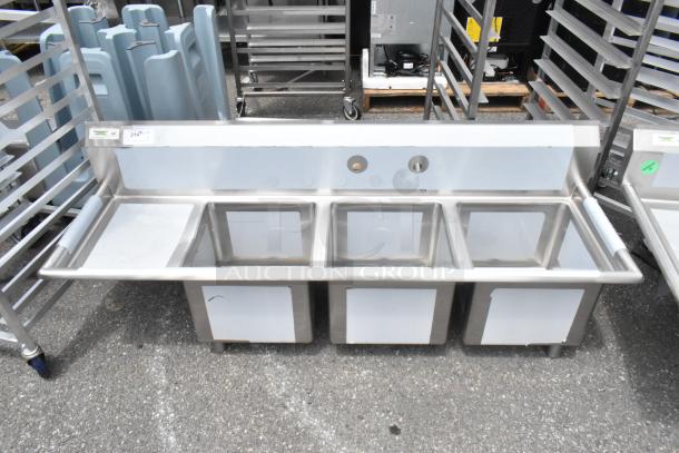 Regency 600S3151515L stainless steel 3 bay sink with left side drain board. Brand new, scratch and dent condition.