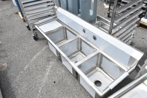 Regency 600S3151515L Stainless Steel 3 Bay Sink with Left Drain Board, new scratch and dent condition.