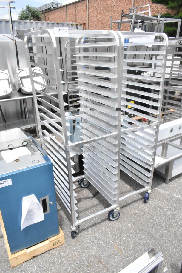 Brand new Advance Tabco PR20-3W bun/sheet pan rack on commercial casters, 20-pan capacity, minor scratches, dented condition.