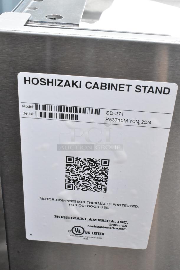Brand new 2024 Hoshizaki SD-271 stainless steel ice machine stand with lockable door; model tag visible.