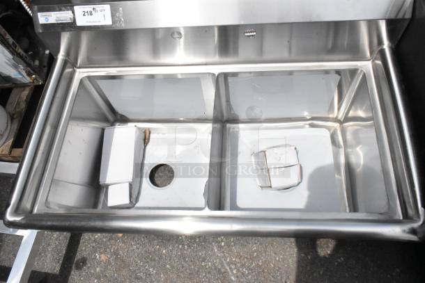 Brand new Steelton 522CS21717 two-compartment stainless steel sink, 39.5", 18 gauge, 17"x17"x12", no legs, minor dents.