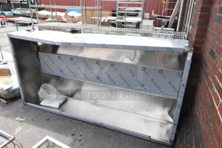 BRAND NEW Clark 8' stainless steel steam hood, scratch and dent condition, protective film partially on, slight dents visible.